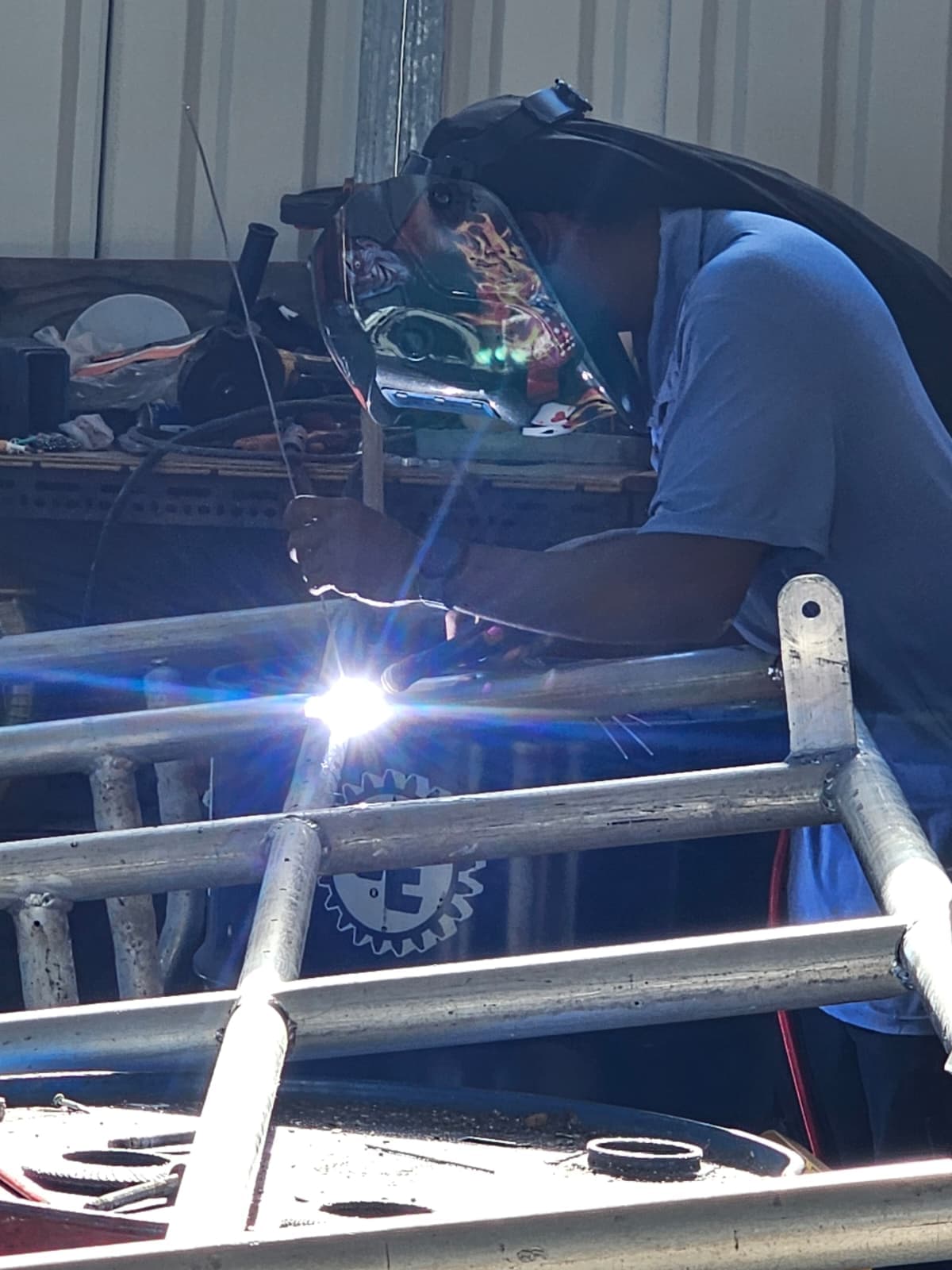TIG-welding an aluminum frame at the bench