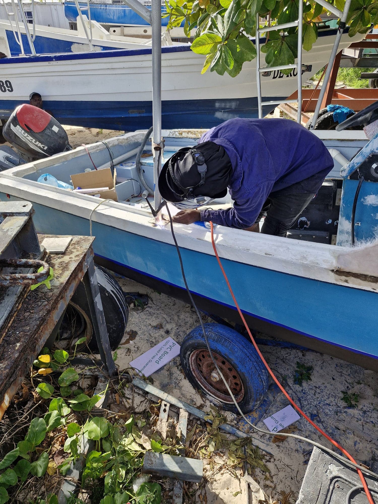TIG-welding a rail mount on a fishing boat